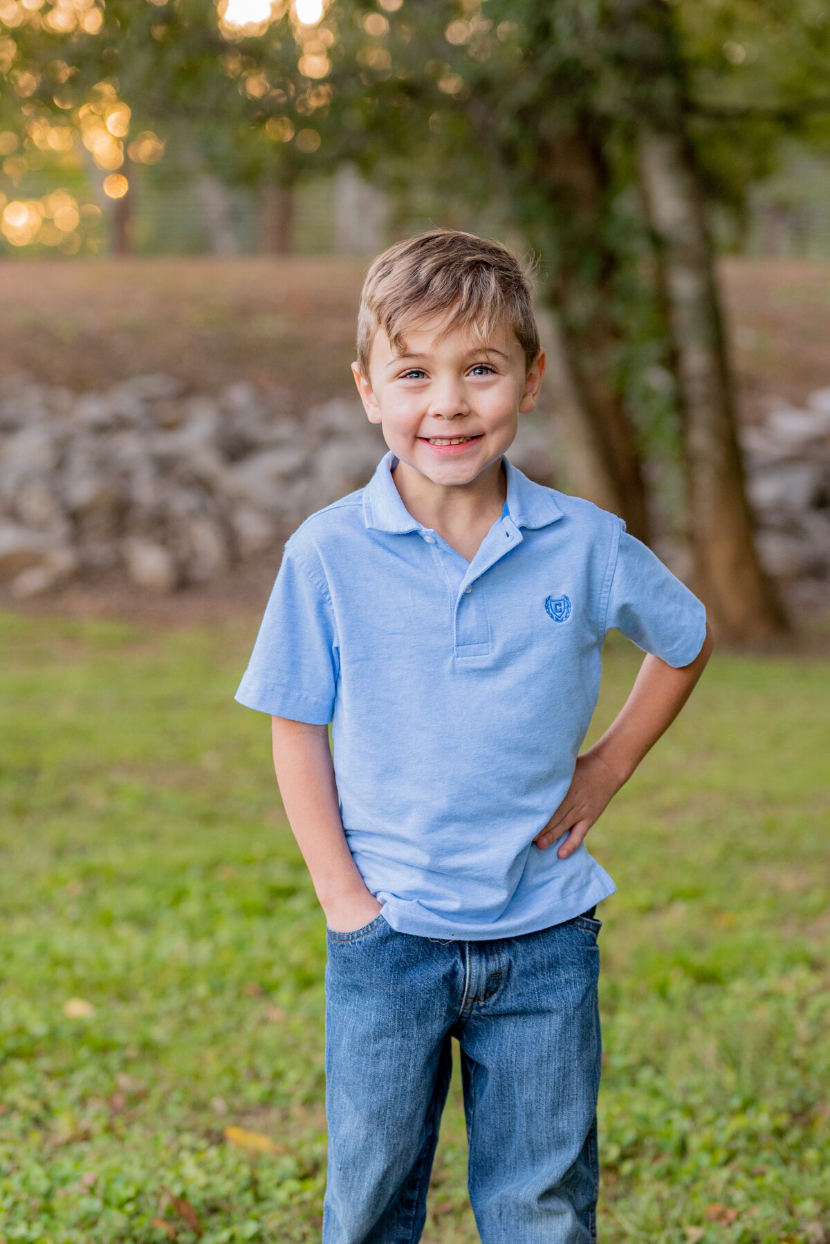 A young boy smiles at the camera at Hayes Nature Preserve in Owens Cross Roads in Alabama