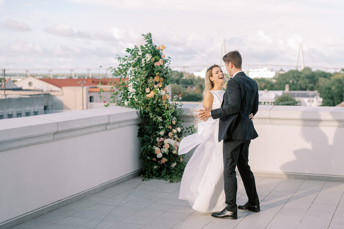 Dancing Bride and Groom at a rooftop intimate wedding in Charleston