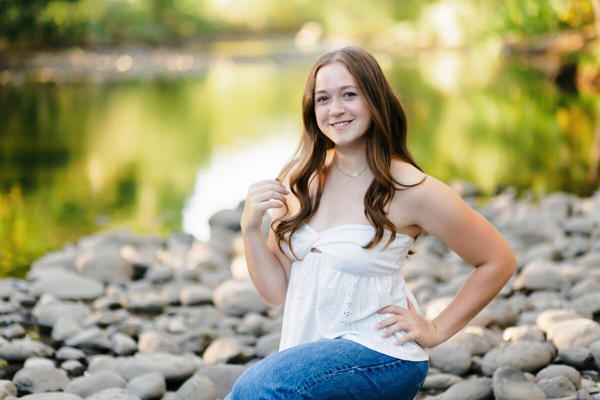 A high school senior poses for a photo during her senior session in Fort Collins, Colorado.