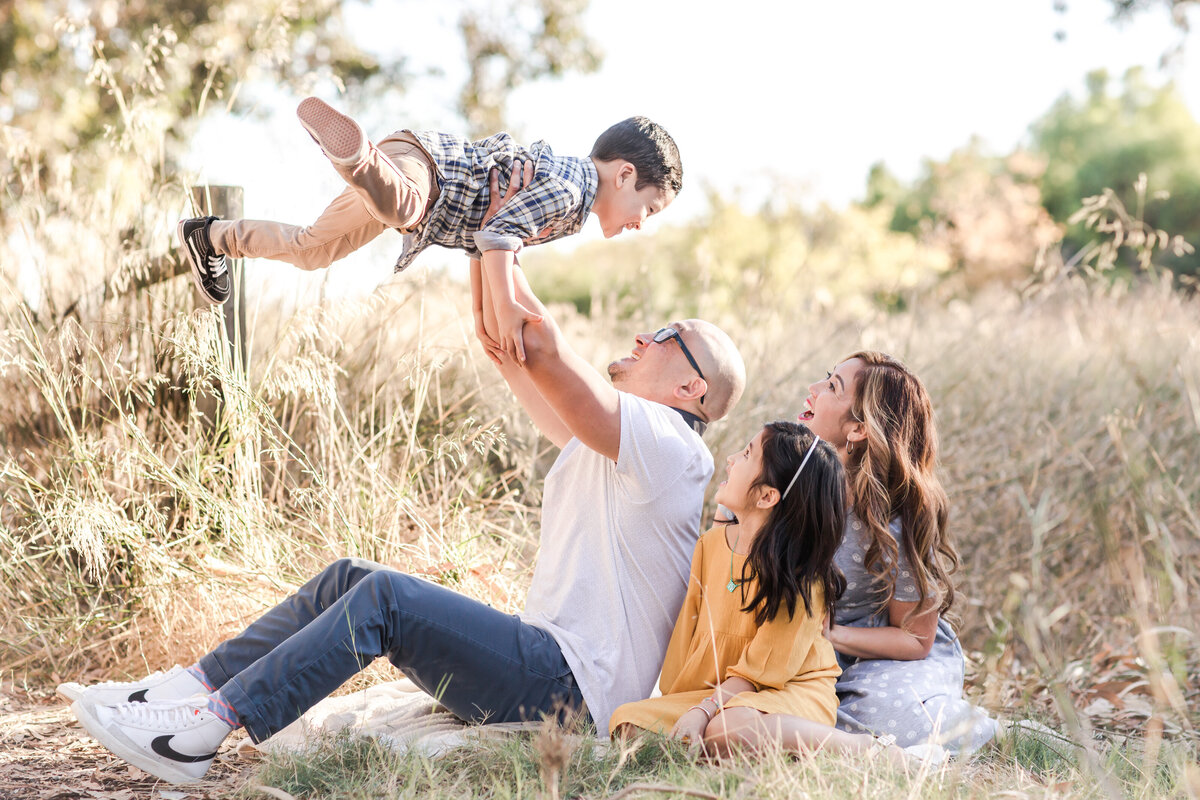 san-diego-family-photography-sitting-in-field