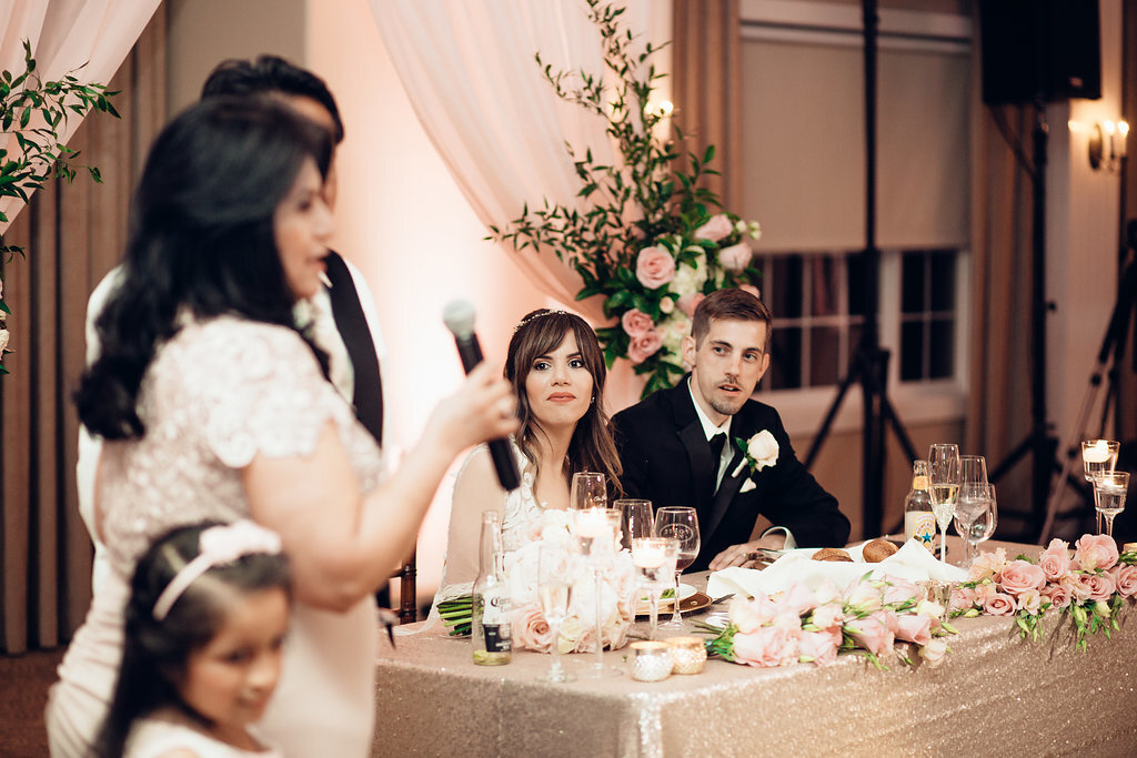 Wedding Photograph Of Woman  In White Dress Speaking In Microphone Los Angeles