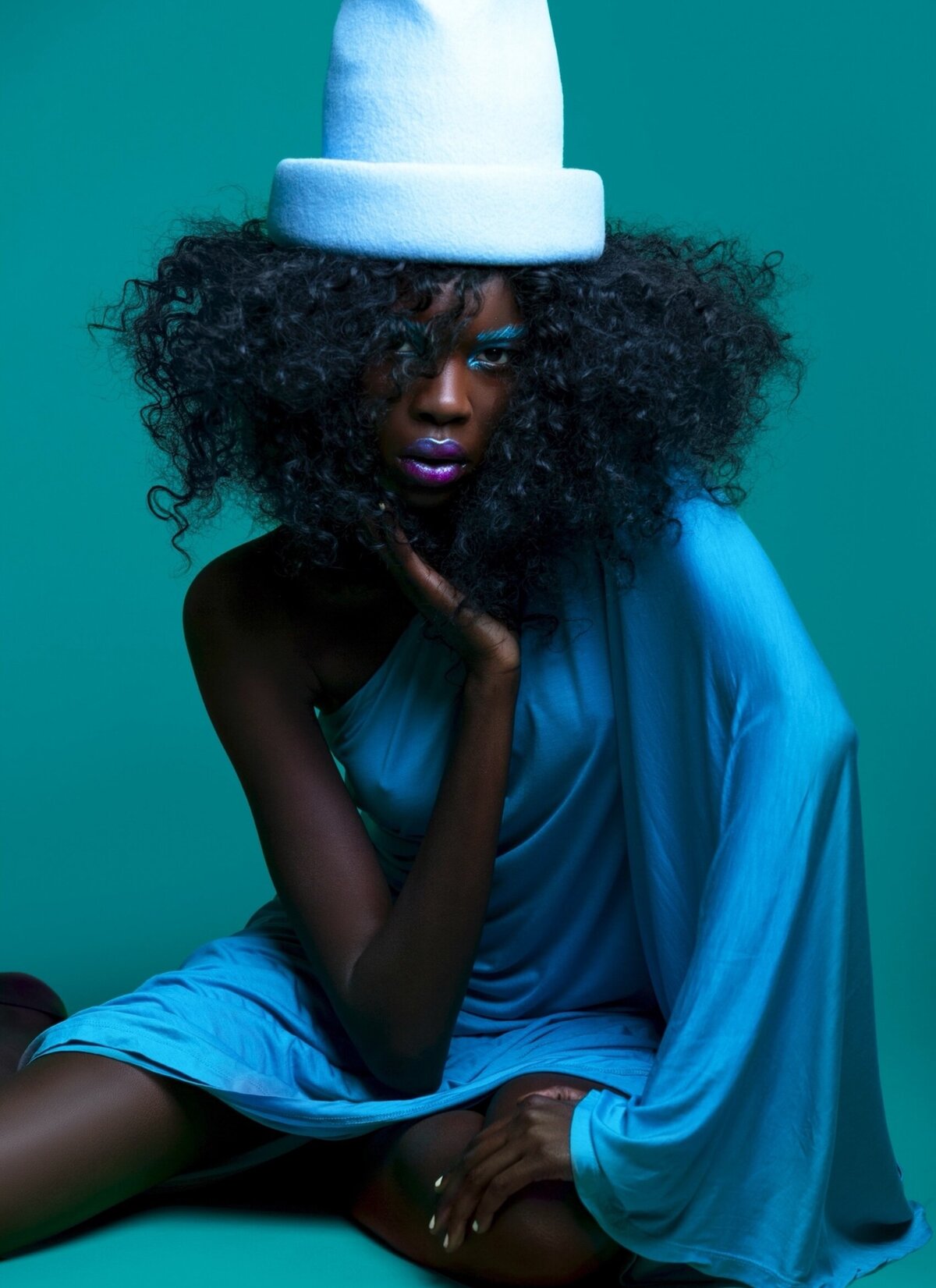 black-woman-blue-outfit-editorial-makeup