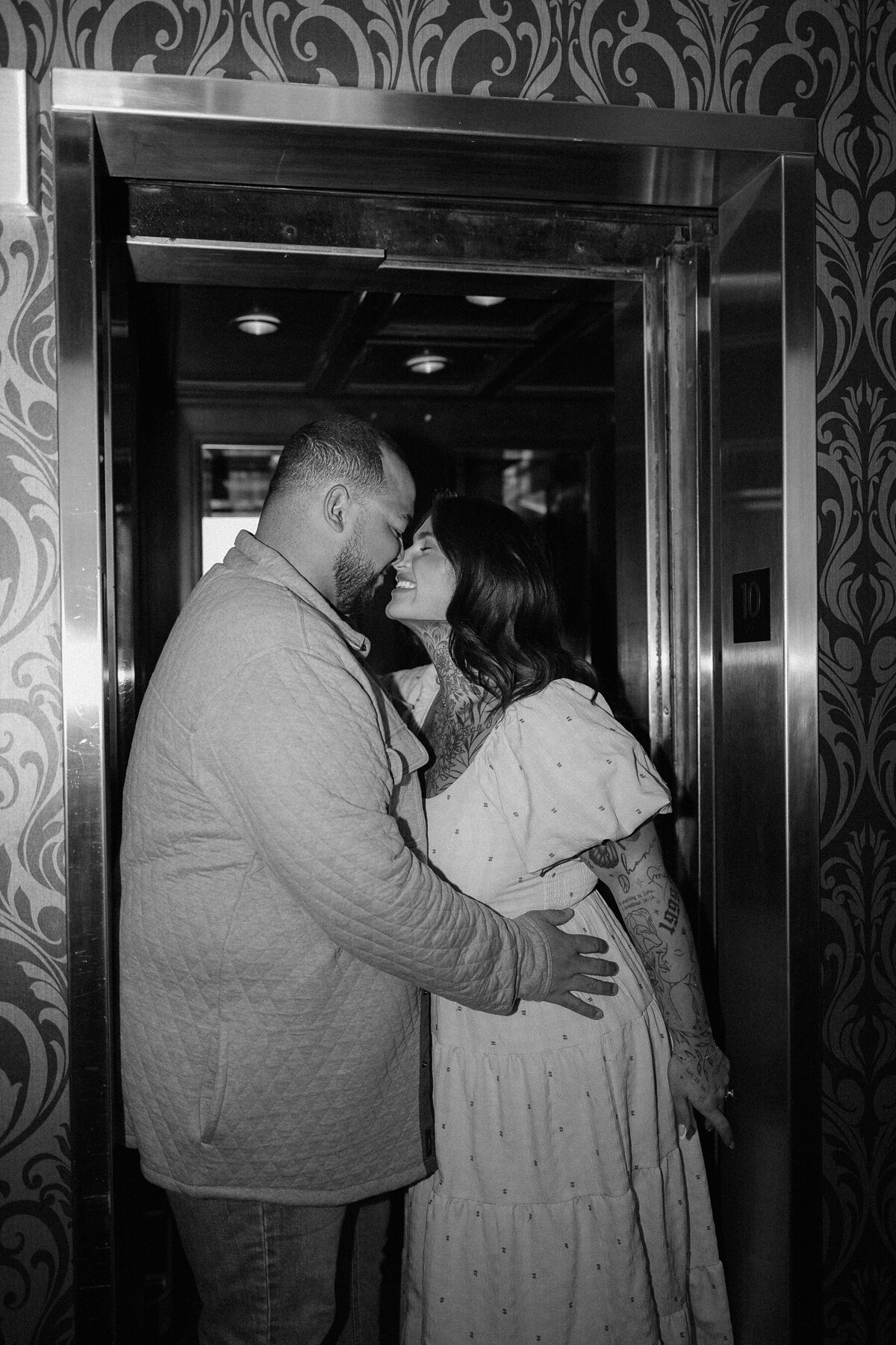 A couple kissing in the Alex Johnson Hotel in downtown Rapid City.