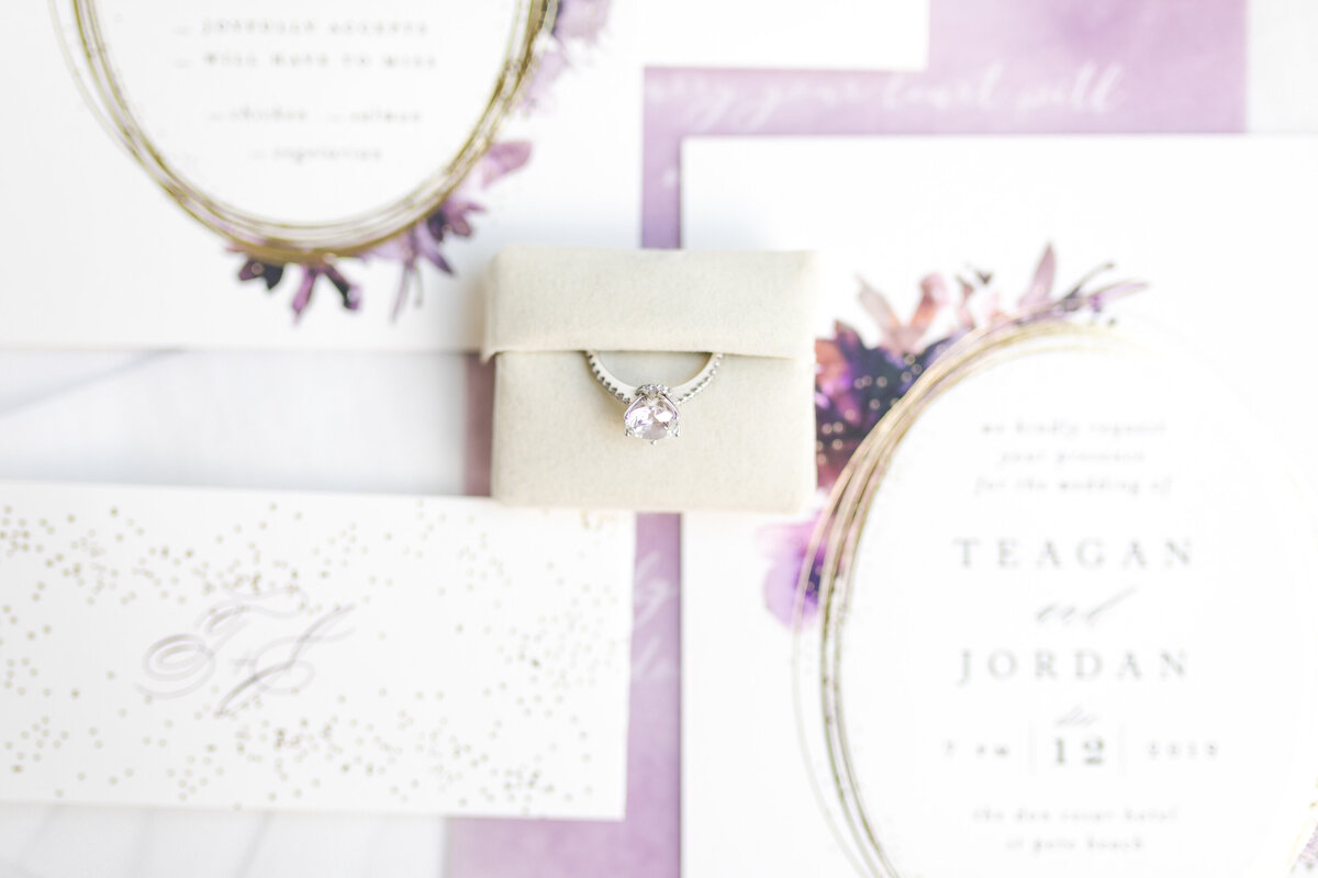 invitation suite with a engagement ring detail