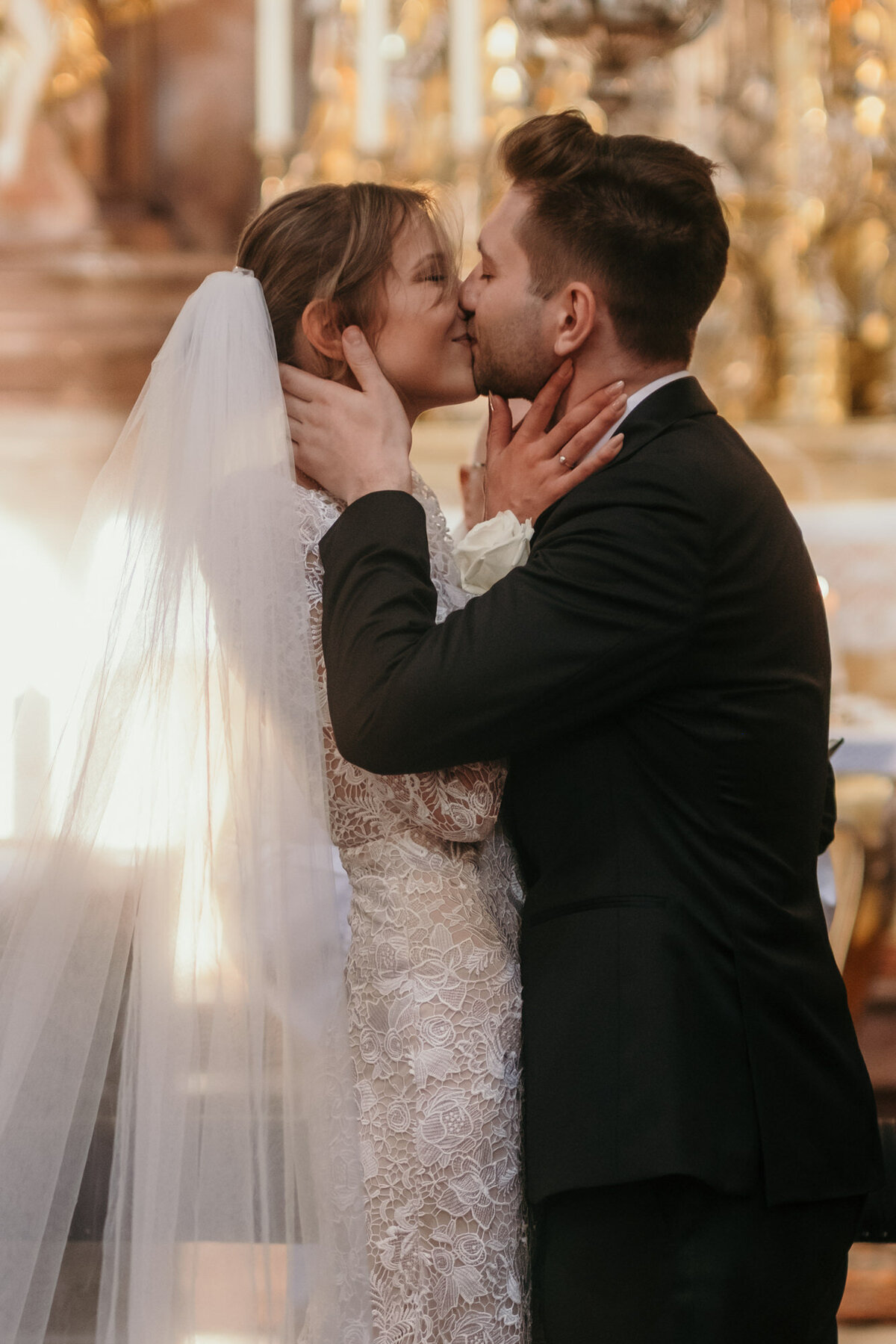 First kiss as husband and wife after wedding vows.