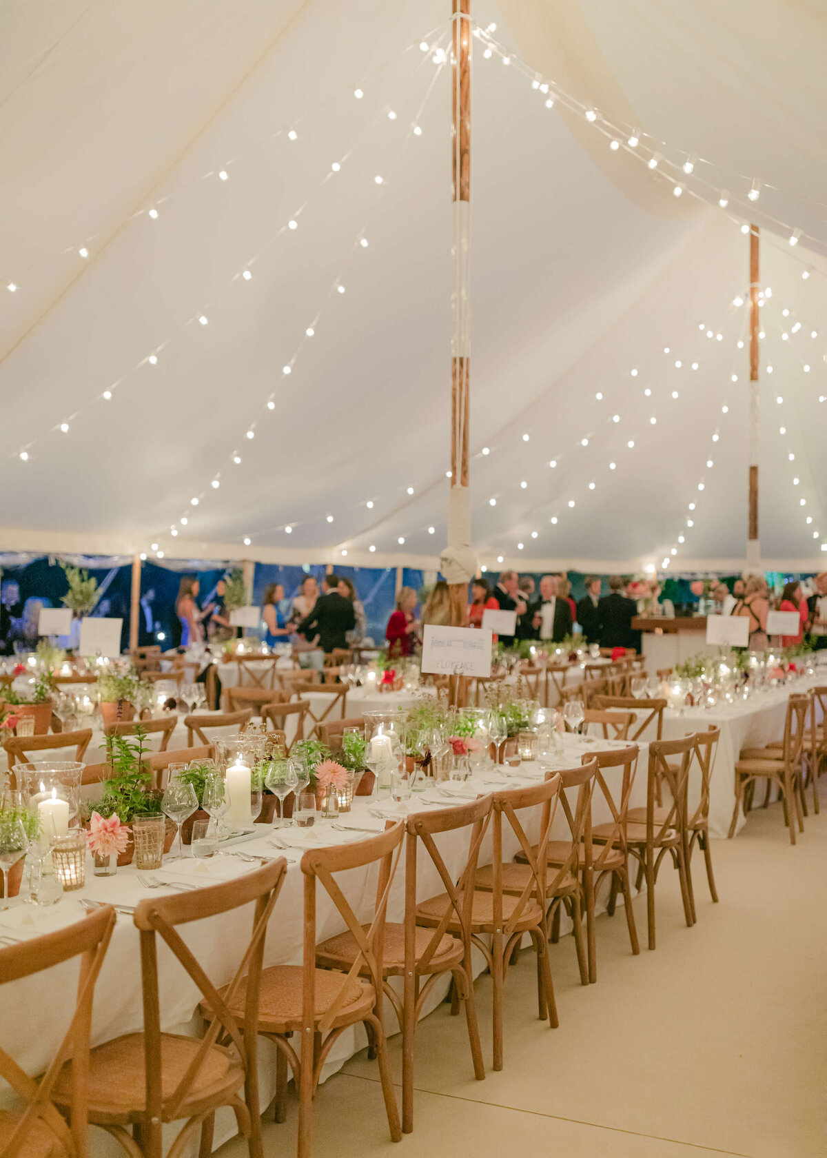 chloe-winstanley-weddings-sailcloth-tent-candlelit-tablescape