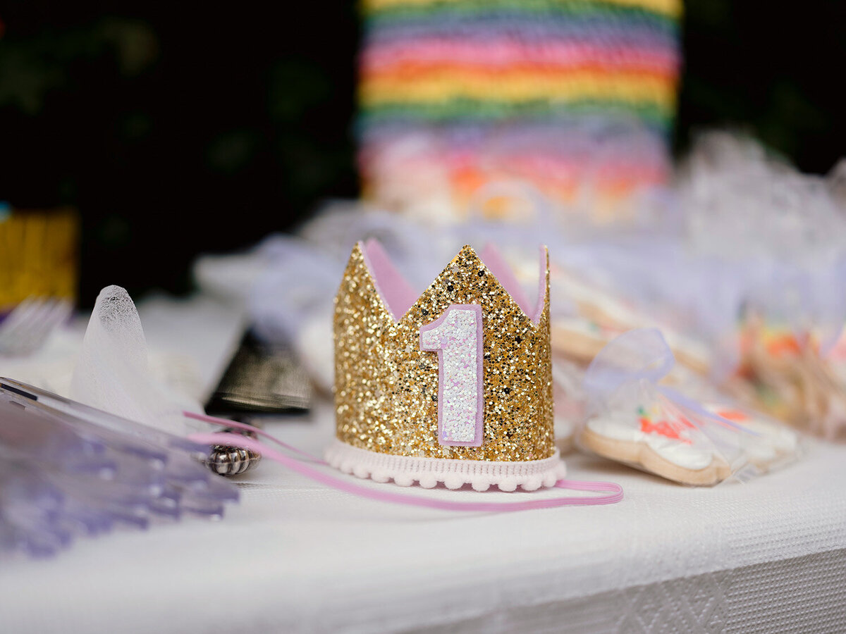 Sparkly gold and pink birthday crown with “ONE” on the front, styled for a first birthday celebration in Novato, captured by a Bay Area first birthday photographer.

