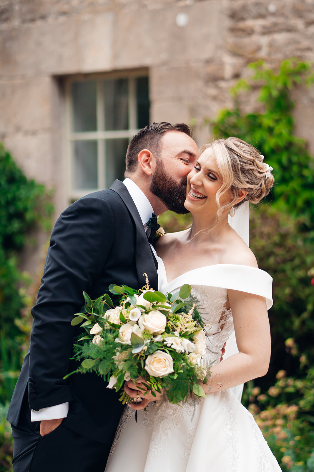 cheltenham-wedding-photographer-couple-walking-through-pauntley-court-gardens