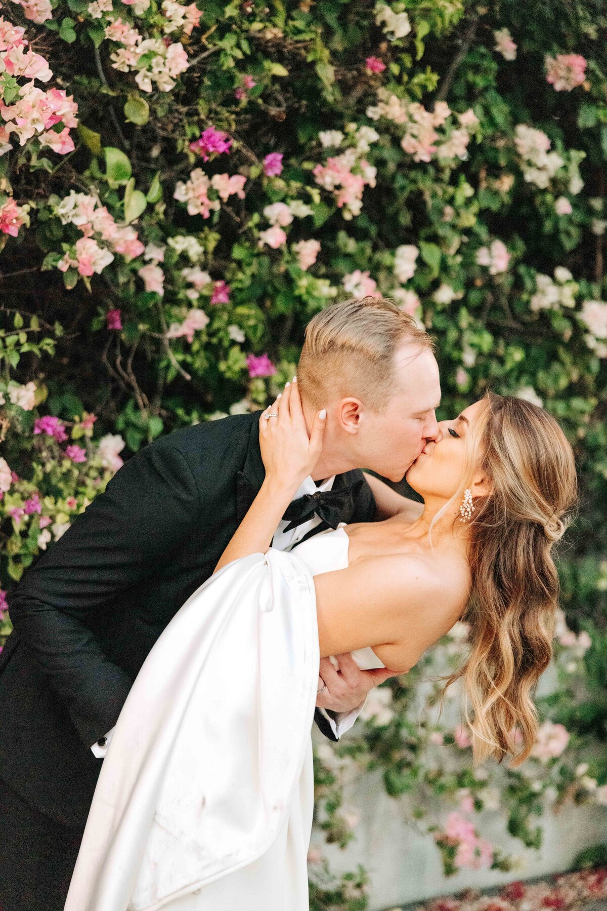 Bride and groom kissing at their Key West wedding at The Ernest Hemingway Home