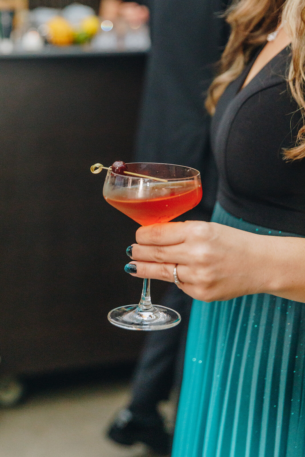 close up of a martini glass at wedding reception