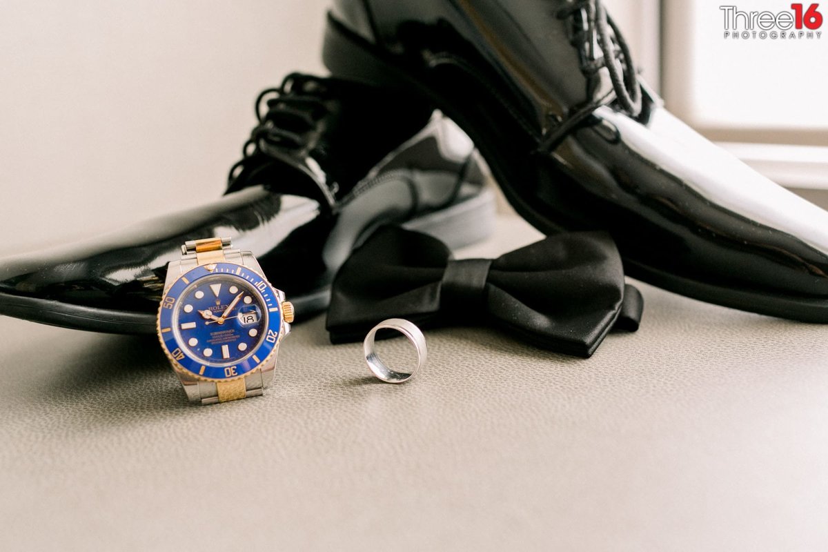 The Groom's dress shoes, watch, sunglasses and wedding band