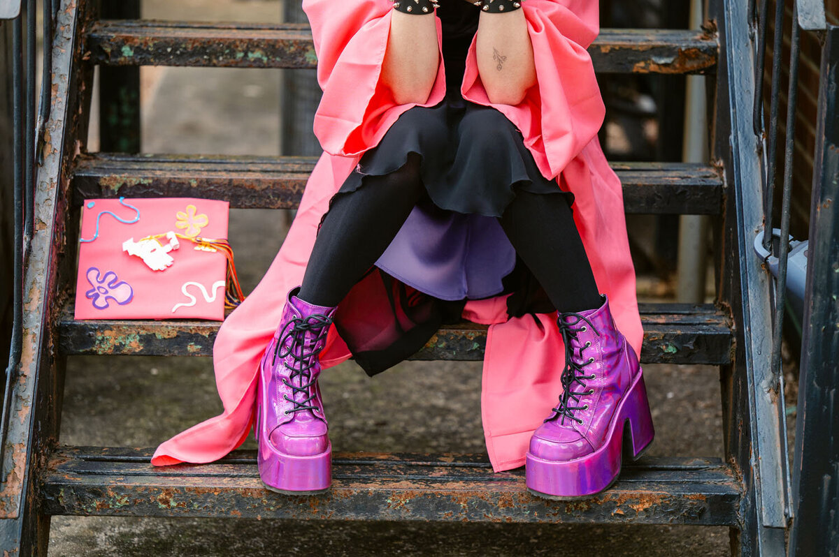 NJ senior photoshoot fun pink cap and gown asbury park-365