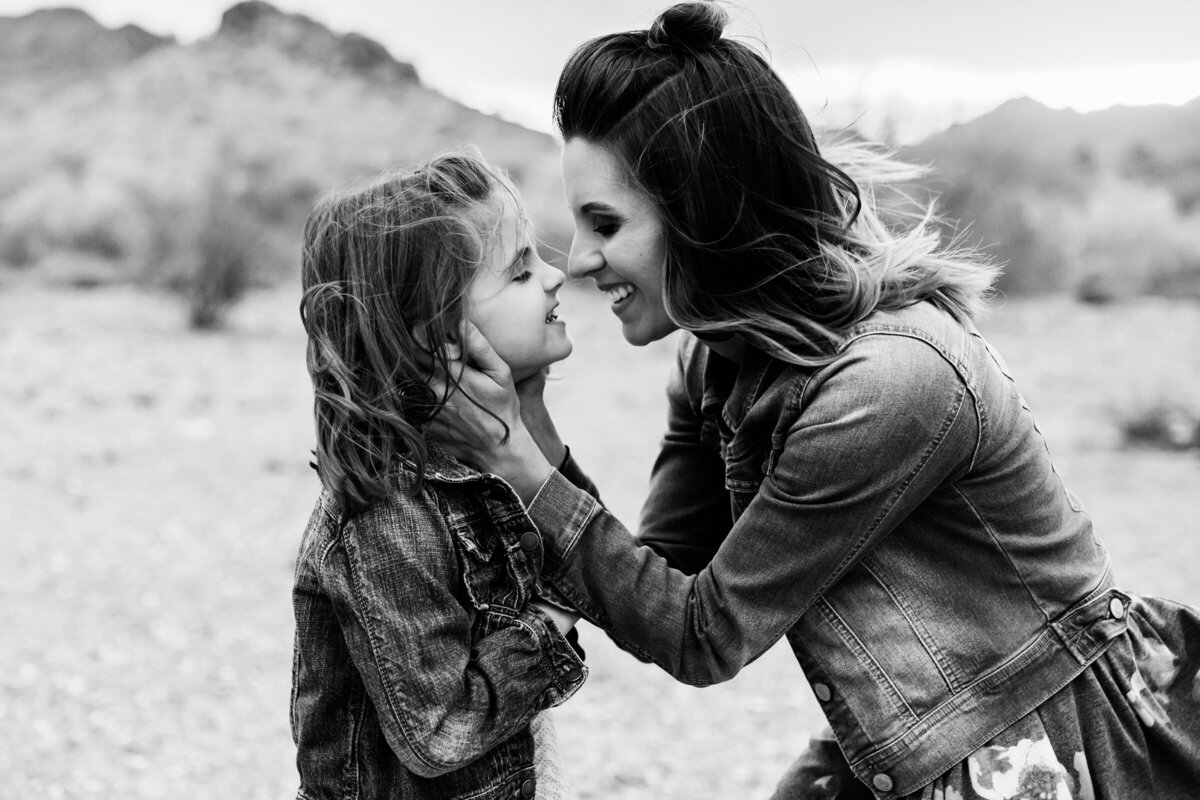 mom and daughter embracing