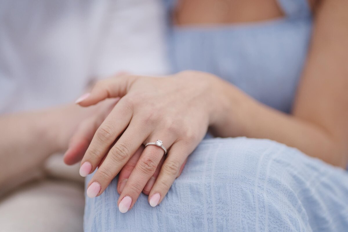 Natural and timeless engagement photos at the beach, capturing genuine moments by the ocean.