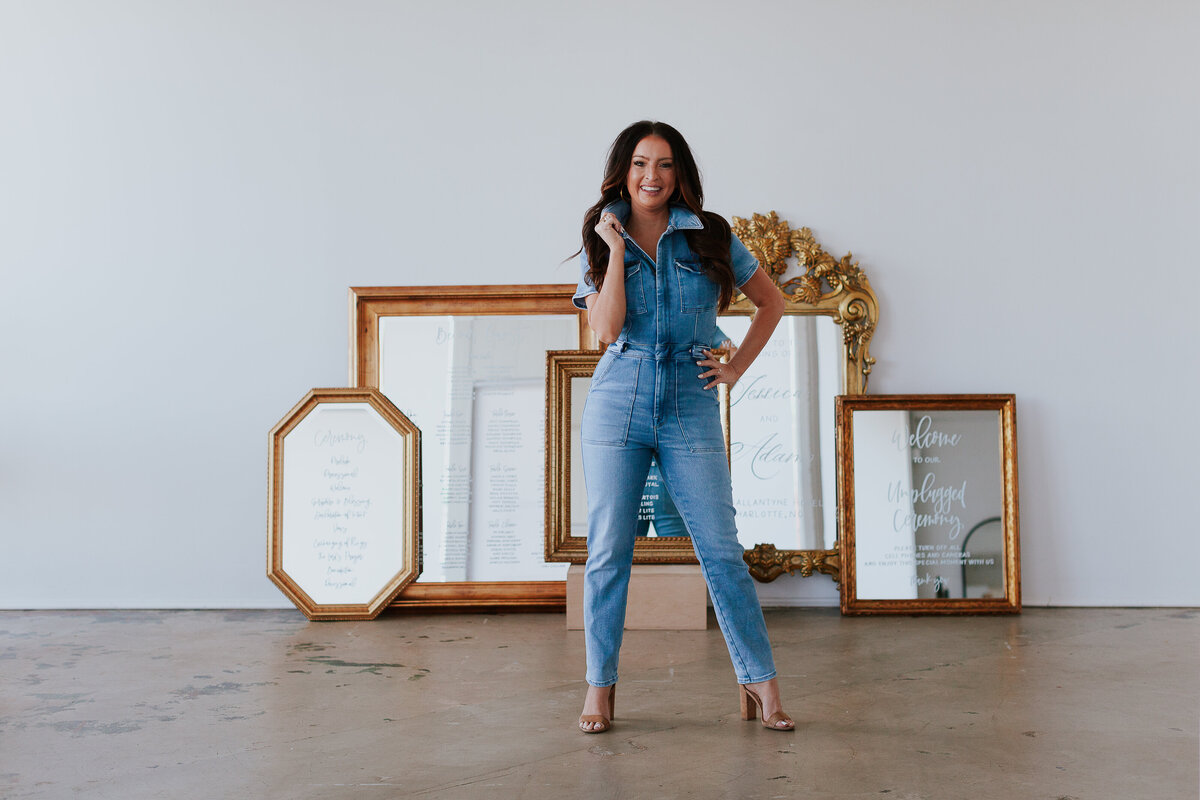 calligrapher-power-pose-portrait-with-antique-mirror-wedding-signs-landscape-orientation-for-brand-session-the-frame-charlotte