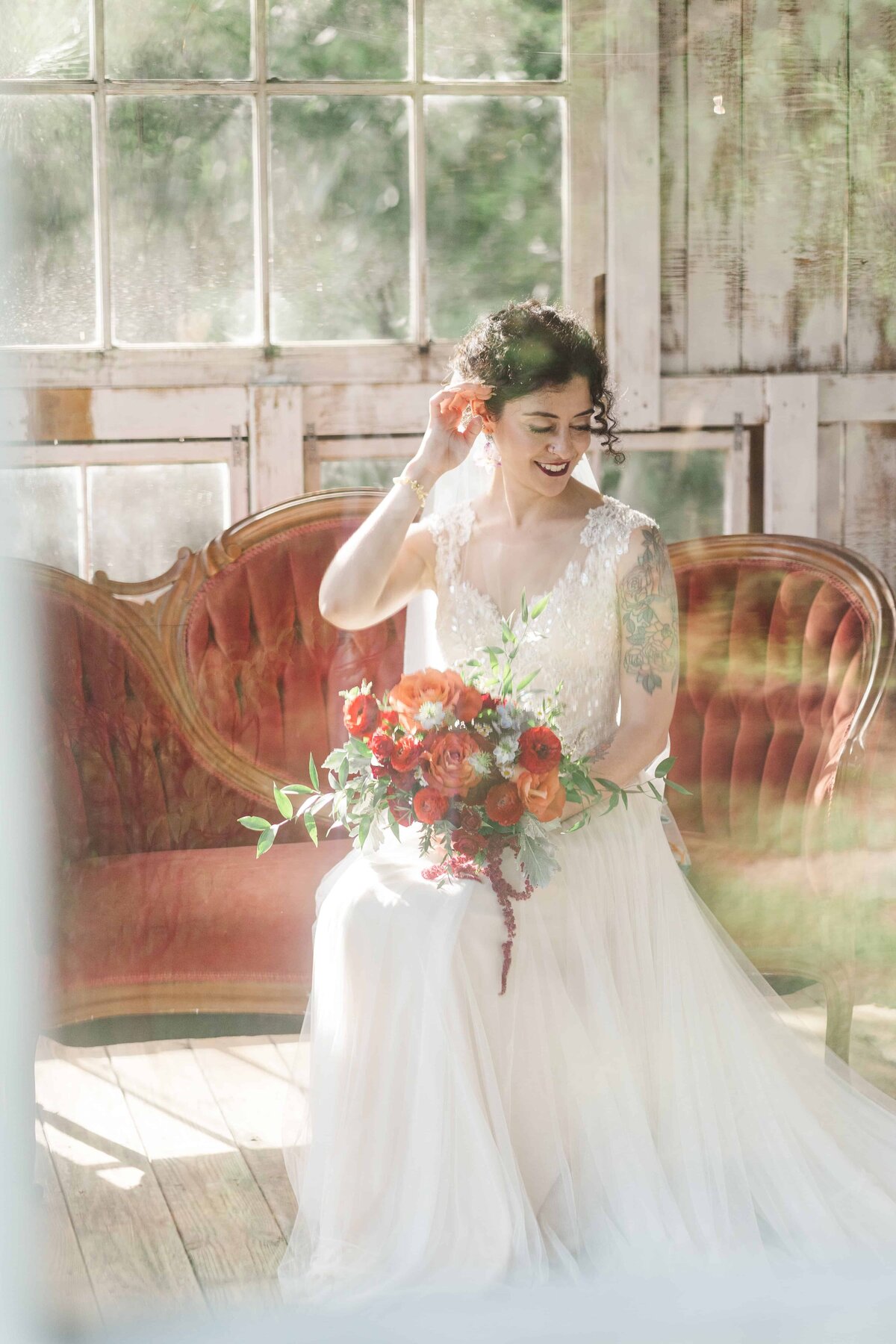 Bridal portraits in the greenhouse of Mariposa Chapel