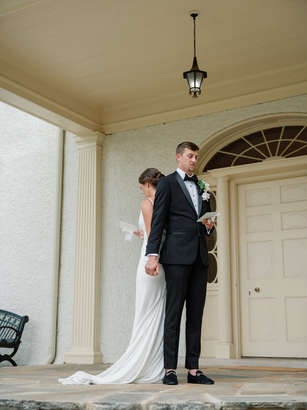 Rust Manor House Wedding | bride and groom share private vows outside of Rust Manor House