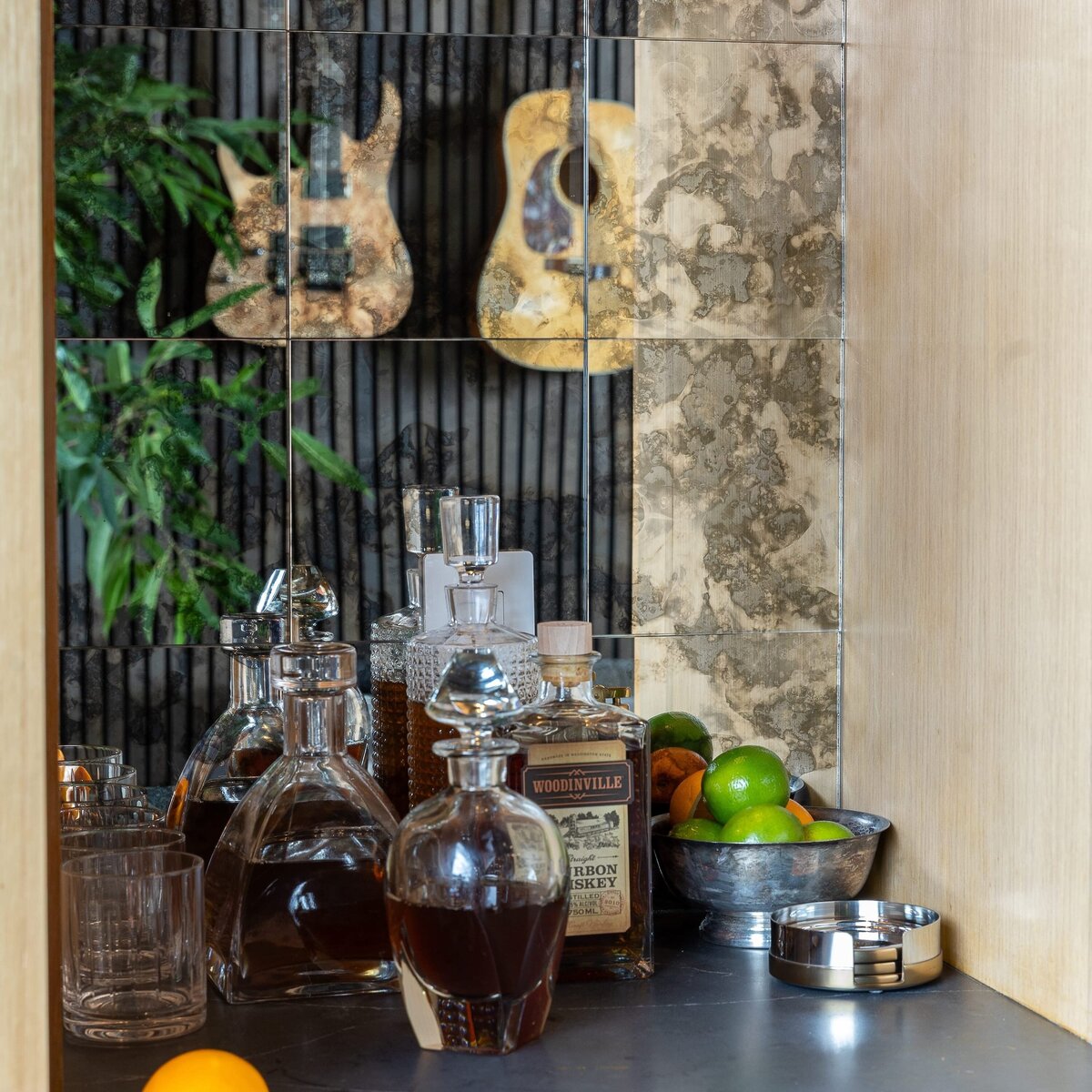 rebekah nicole interiors arbor garage room coktail bar with bowl of limes