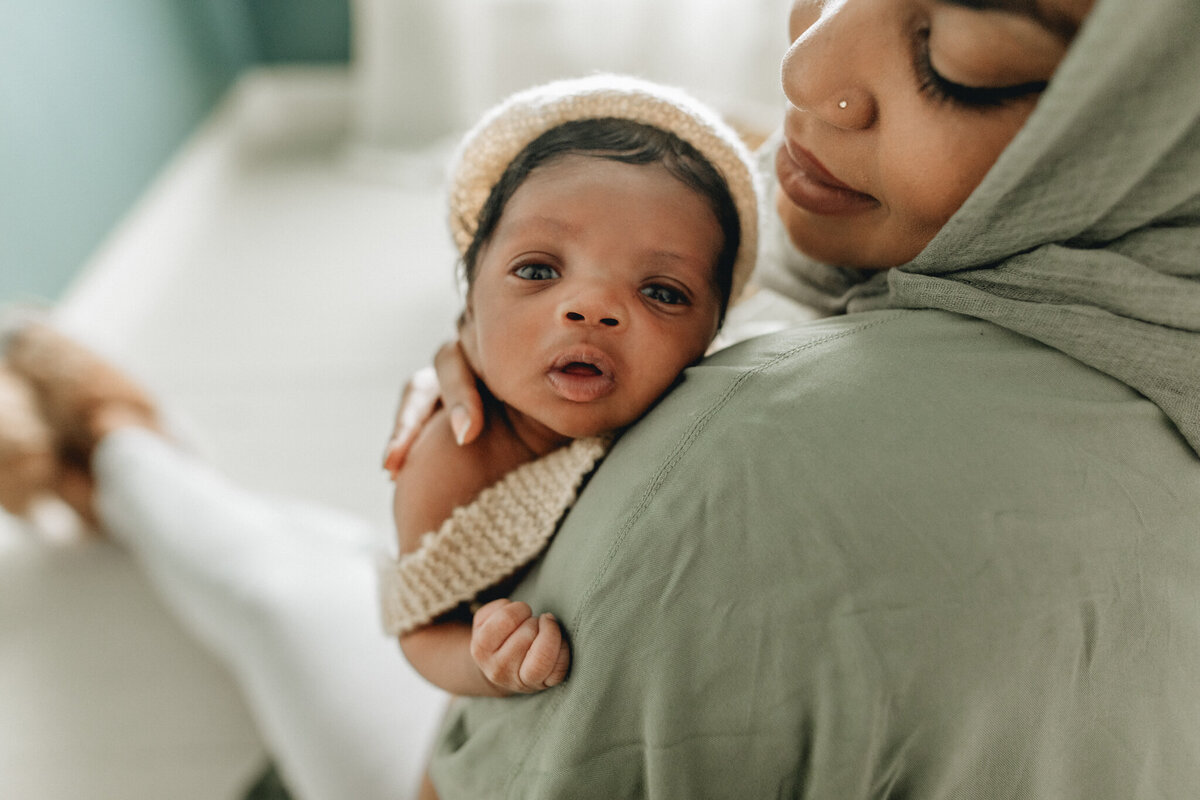 Family Photoshoot Session  with mom holding newborn baby