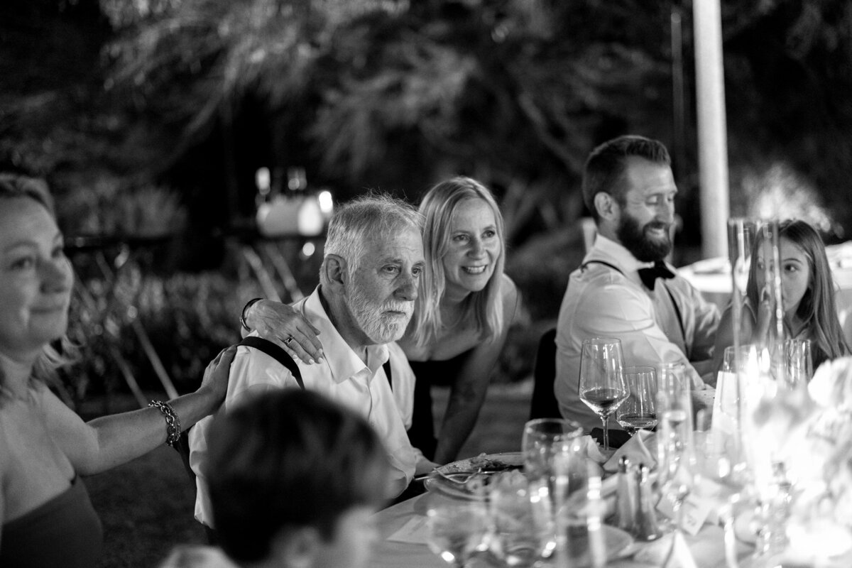 Guests watching mother son dance at wedding reception