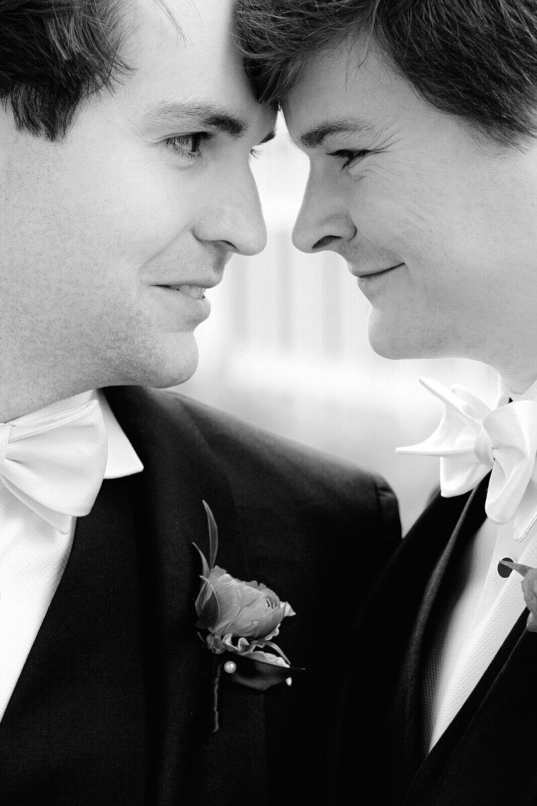 Black and white close-up portrait of same-sex couple Ryan and Andrew at the Swexan Hotel.