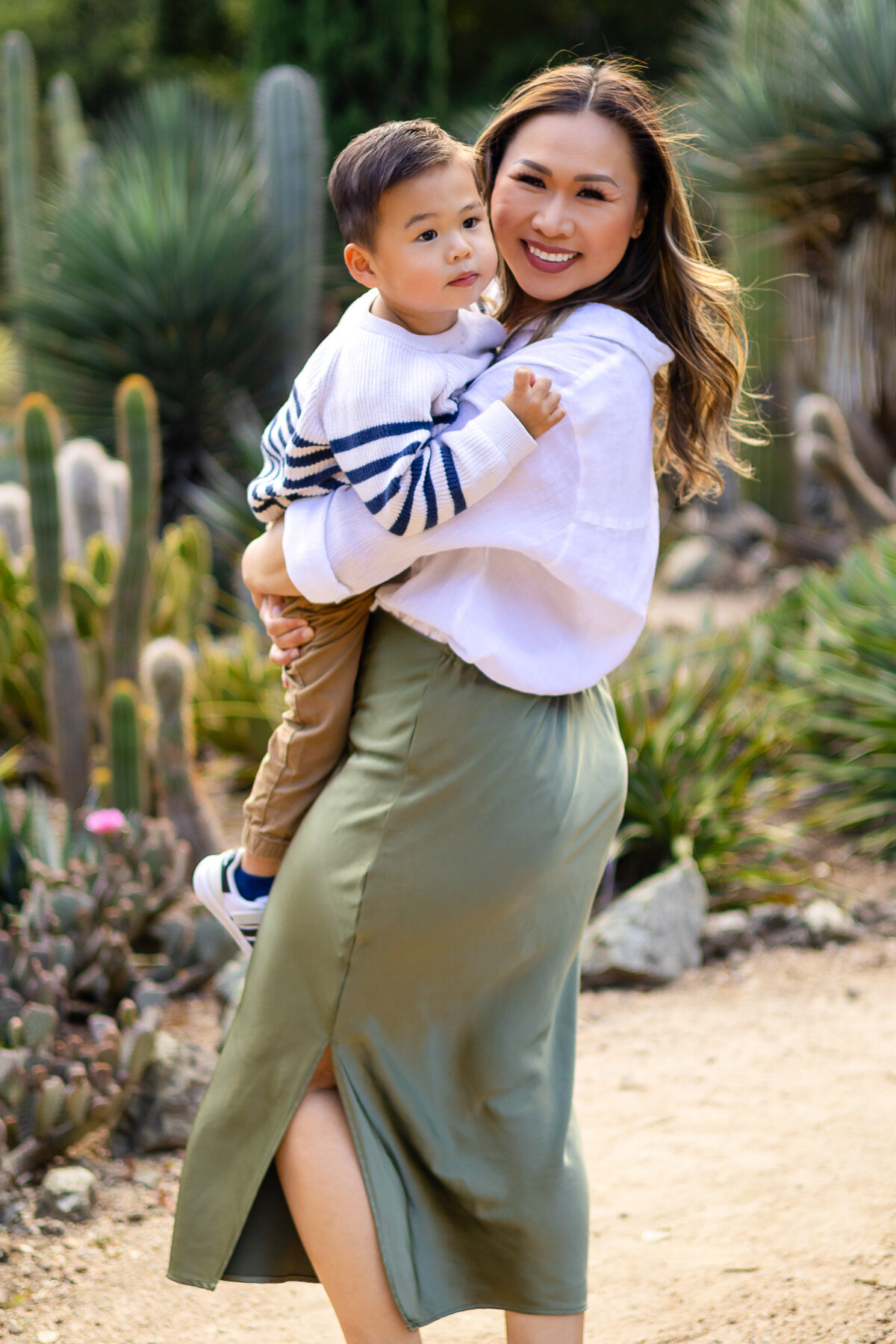 Mom and her toddler son during a playful family photo session  – Ellobelle Photography, lifestyle family photographer on the San Francisco Peninsula Stanford cactus garden Arizona Garden palo Alto