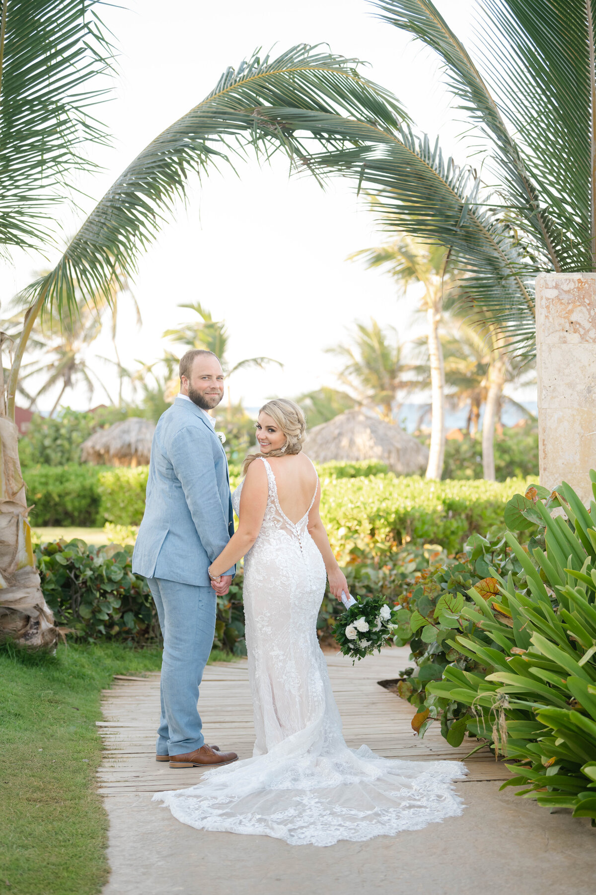 a couple on a path at their wedding in Punta Cana