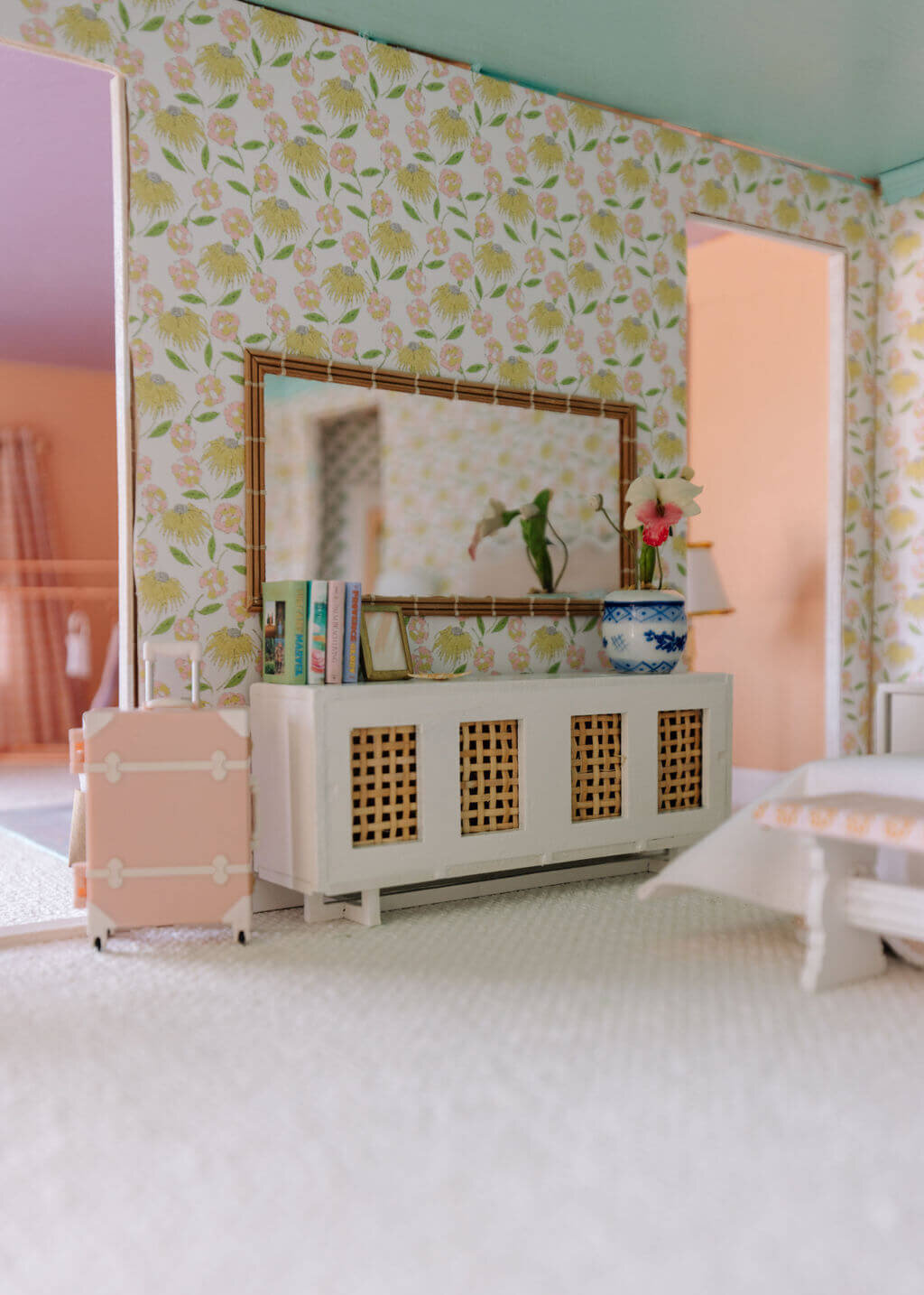 oyster creek studios petite palm beach dollhouse white console table with pink luggage  and long mirror