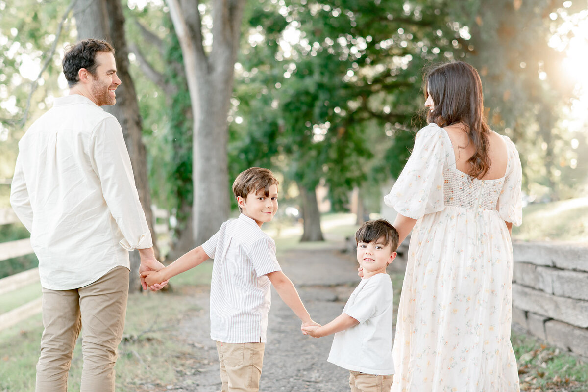 Family walks down a path at Ellington Ag Center in Nashville, TN