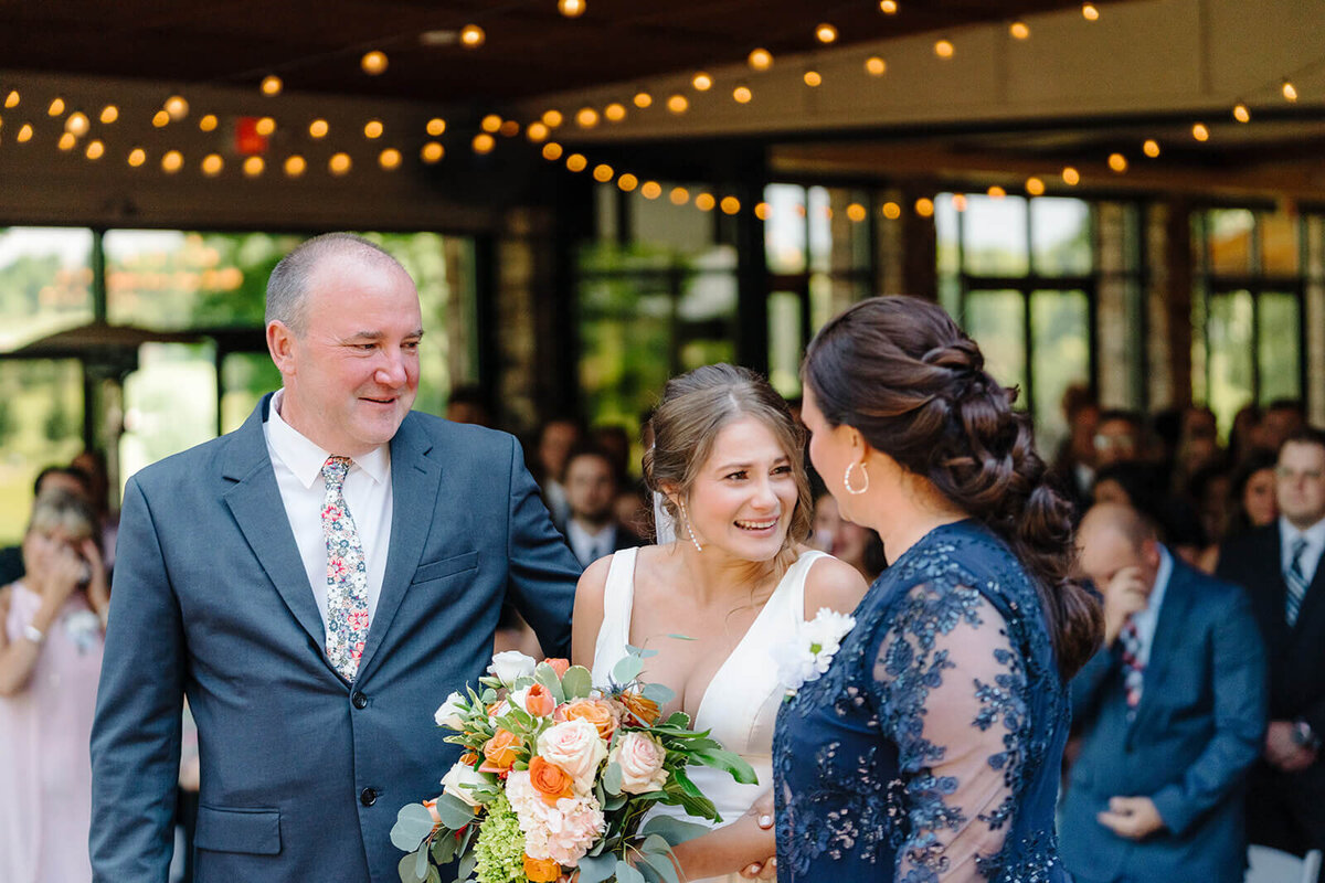 Bride with mother and father at Oswego wedding, NY
