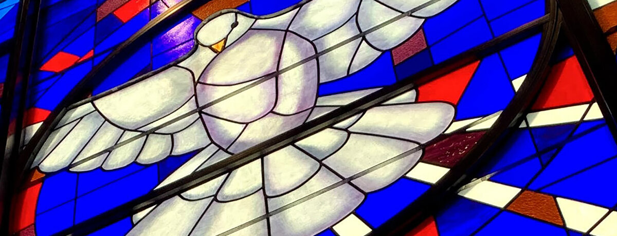 Up-close shot of Bartlett Chapel's stained glass window in sanctuary