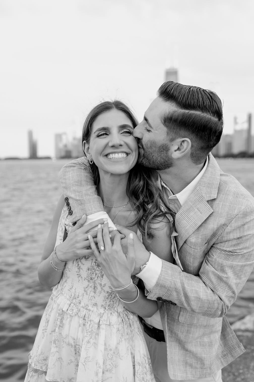 An engagement photography session at The Wrigley Building and North Ave Beach in Chicago, Illinois - 30