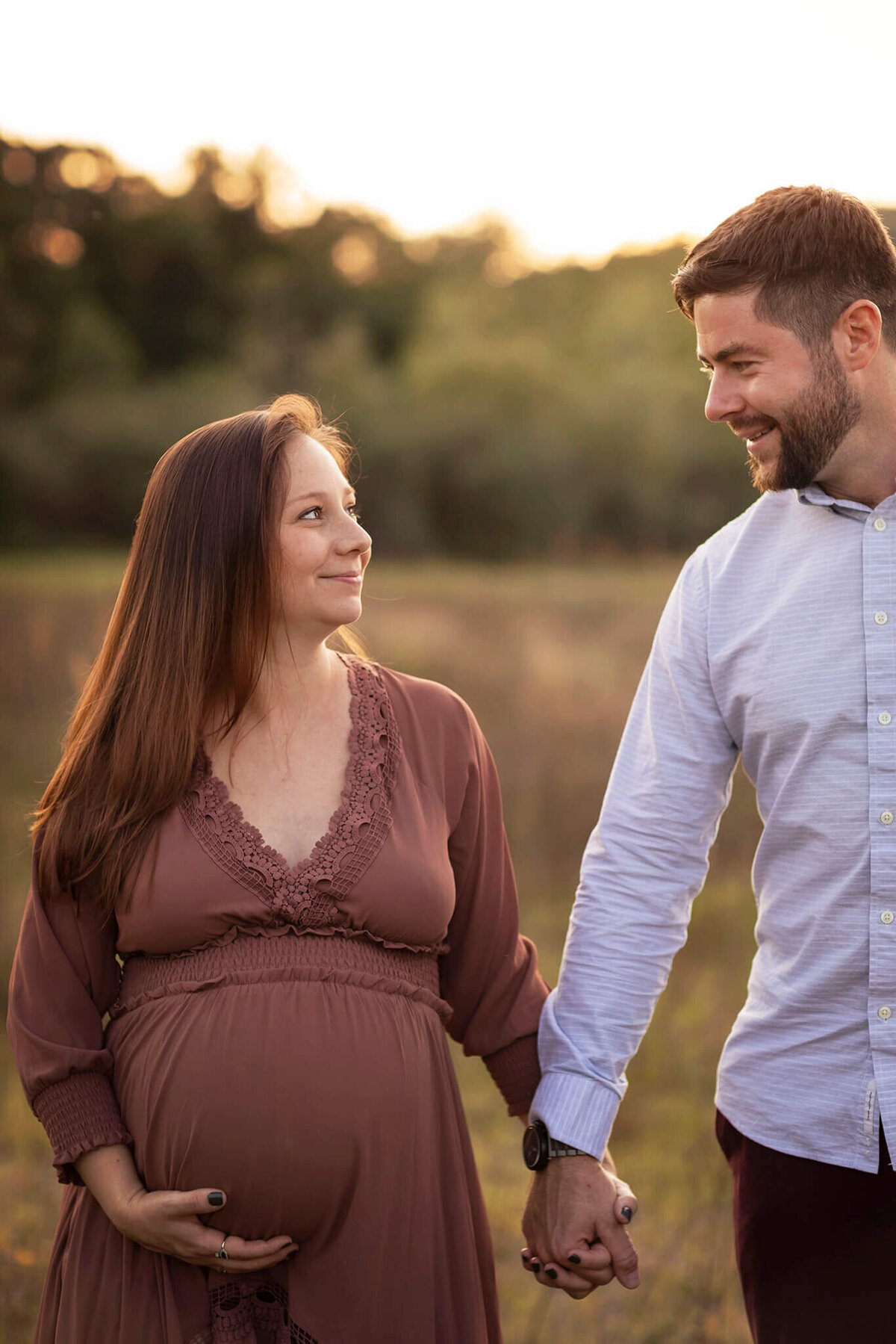 NJ Maternity Photographer captures expecting couple holding hands