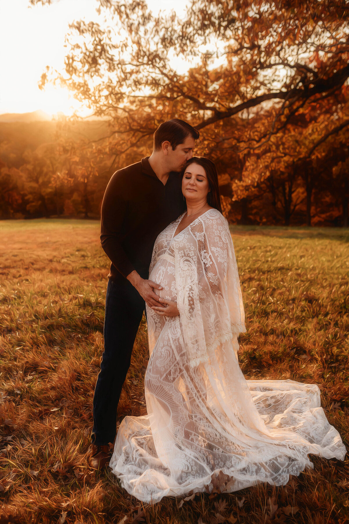 Expectant parents pose for portraits during their babymoon in Asheville, NC.