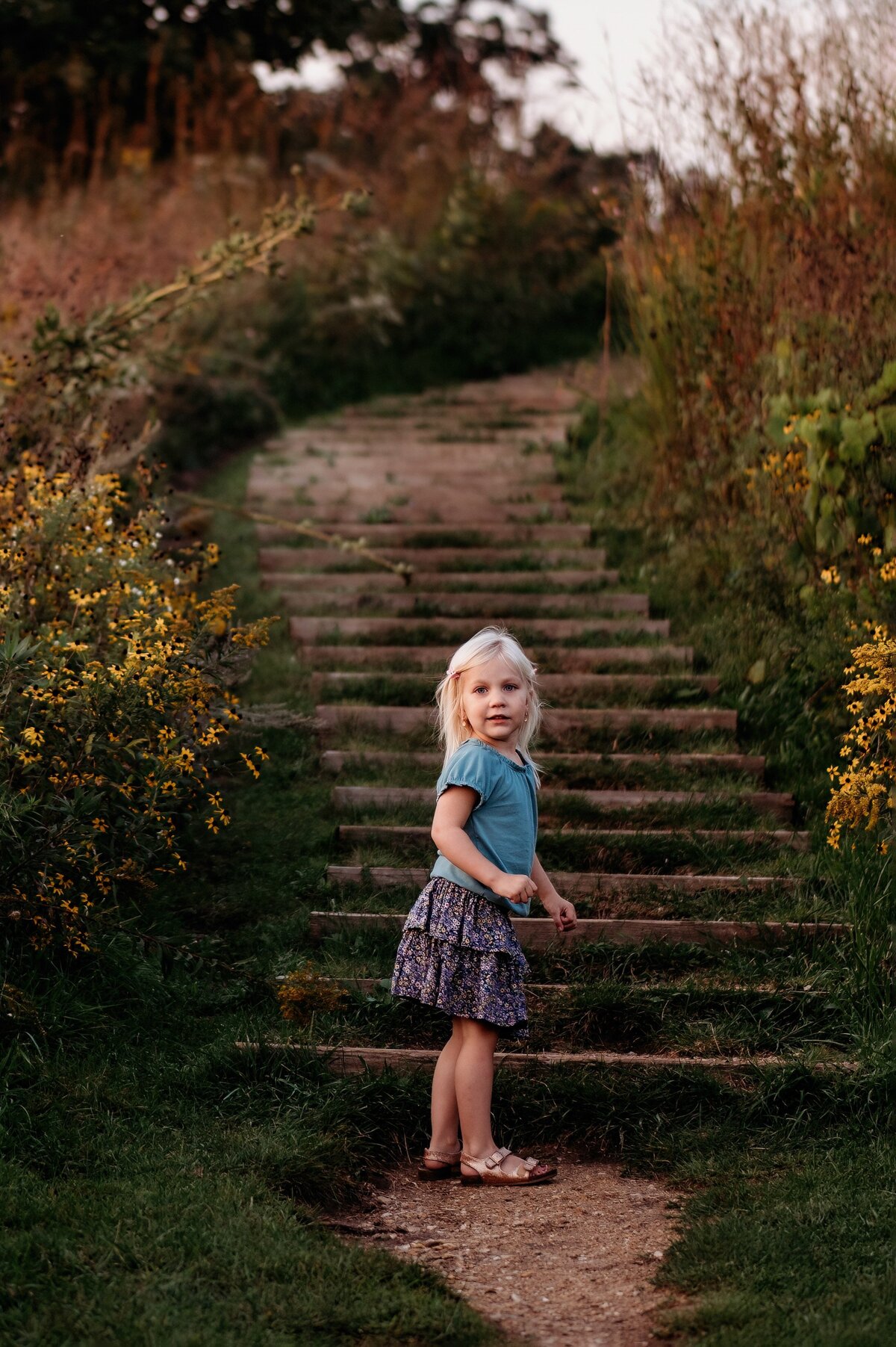 Child at staircase McKennaPattersonPhotography