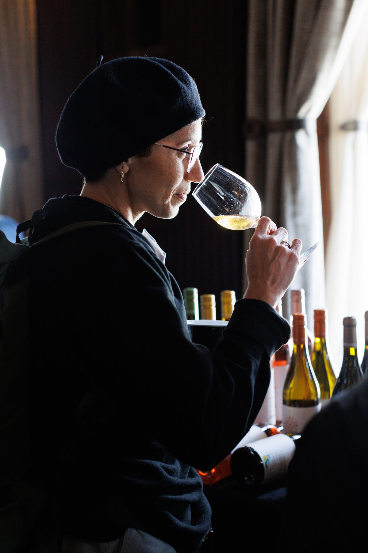 Female enjoying a glass of wine