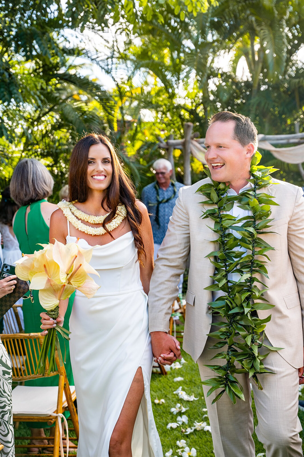 kona wedding photography of bride and groom walking down aisle