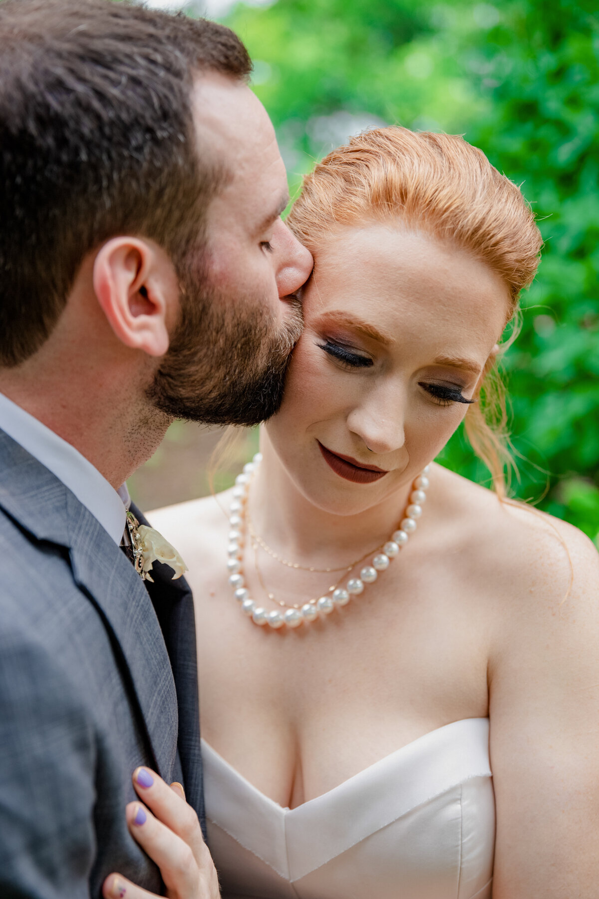 groom-kissing-his-bride