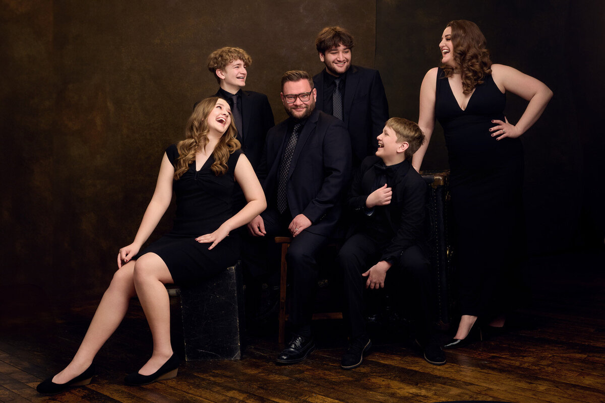 Elegant Family Portrait in Formal Attire with Laughter and Joy-79