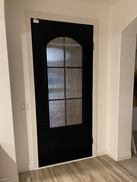 RIVERSIDE-IRON-DOOR