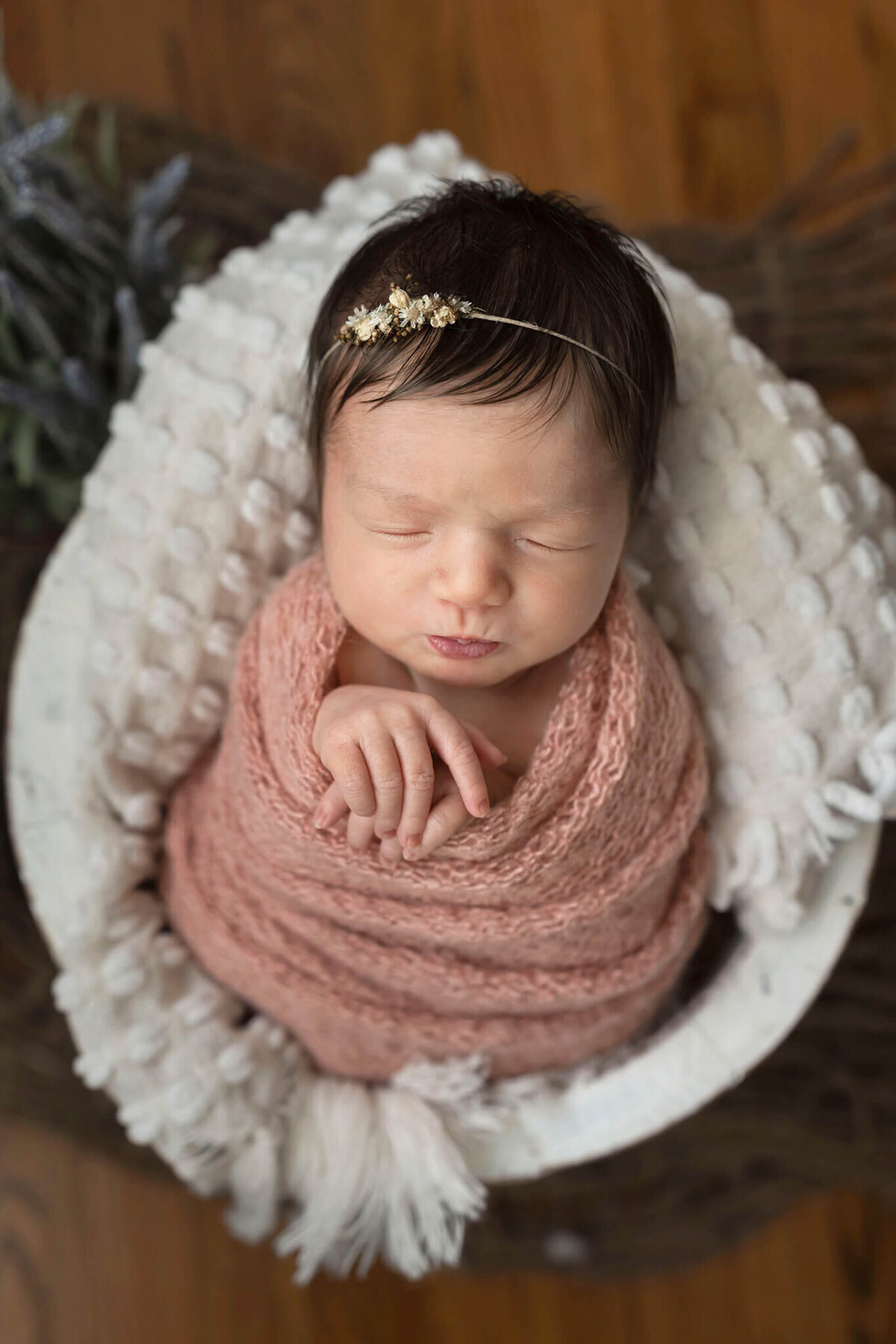 NJ Newborn photography session with baby girl in bucket
