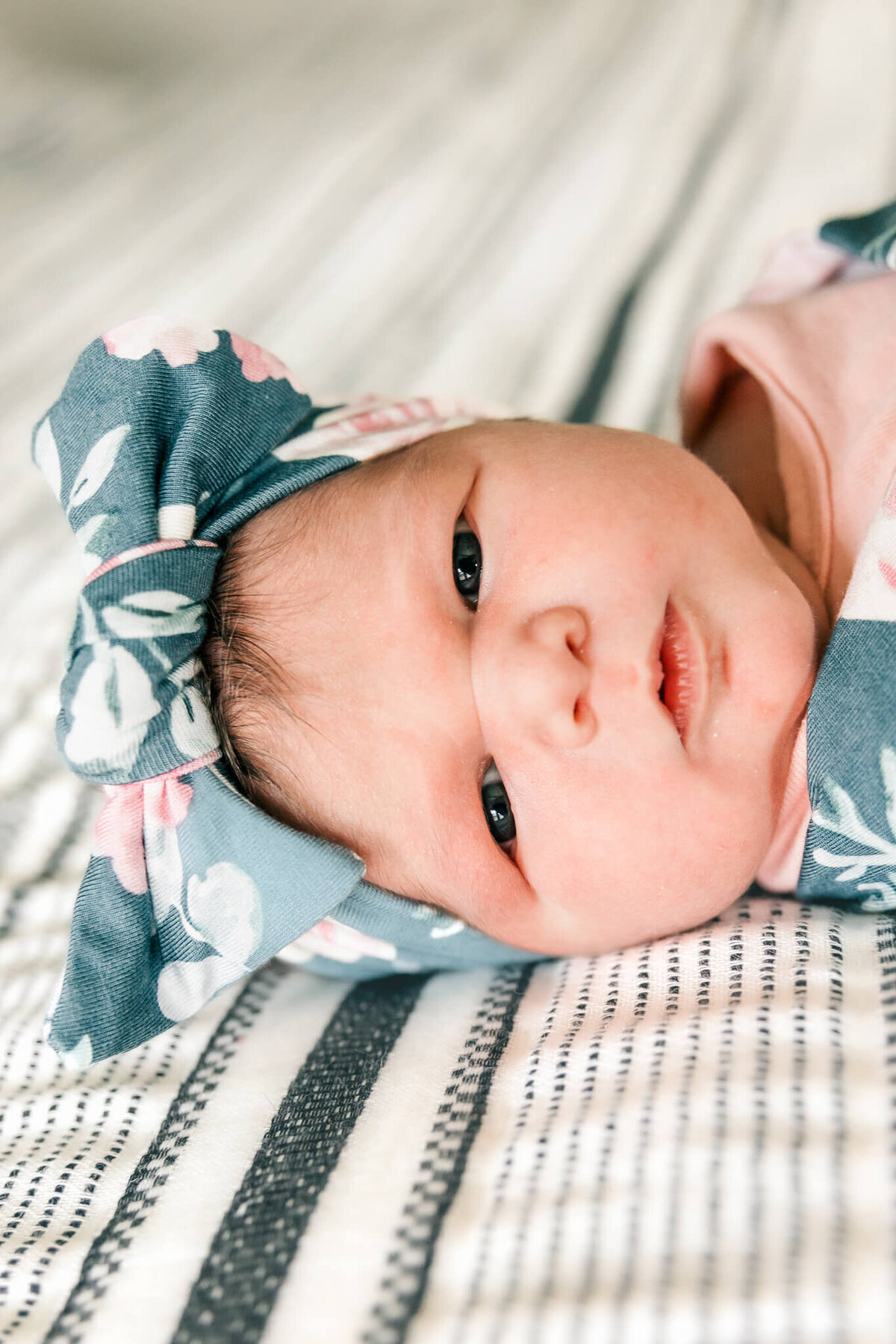 Baby with blue band on