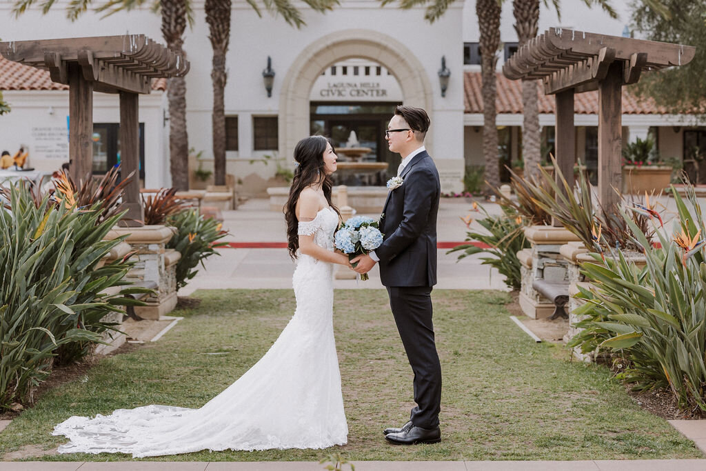 Laguna Hills Wedding, bride and groom on front lawn