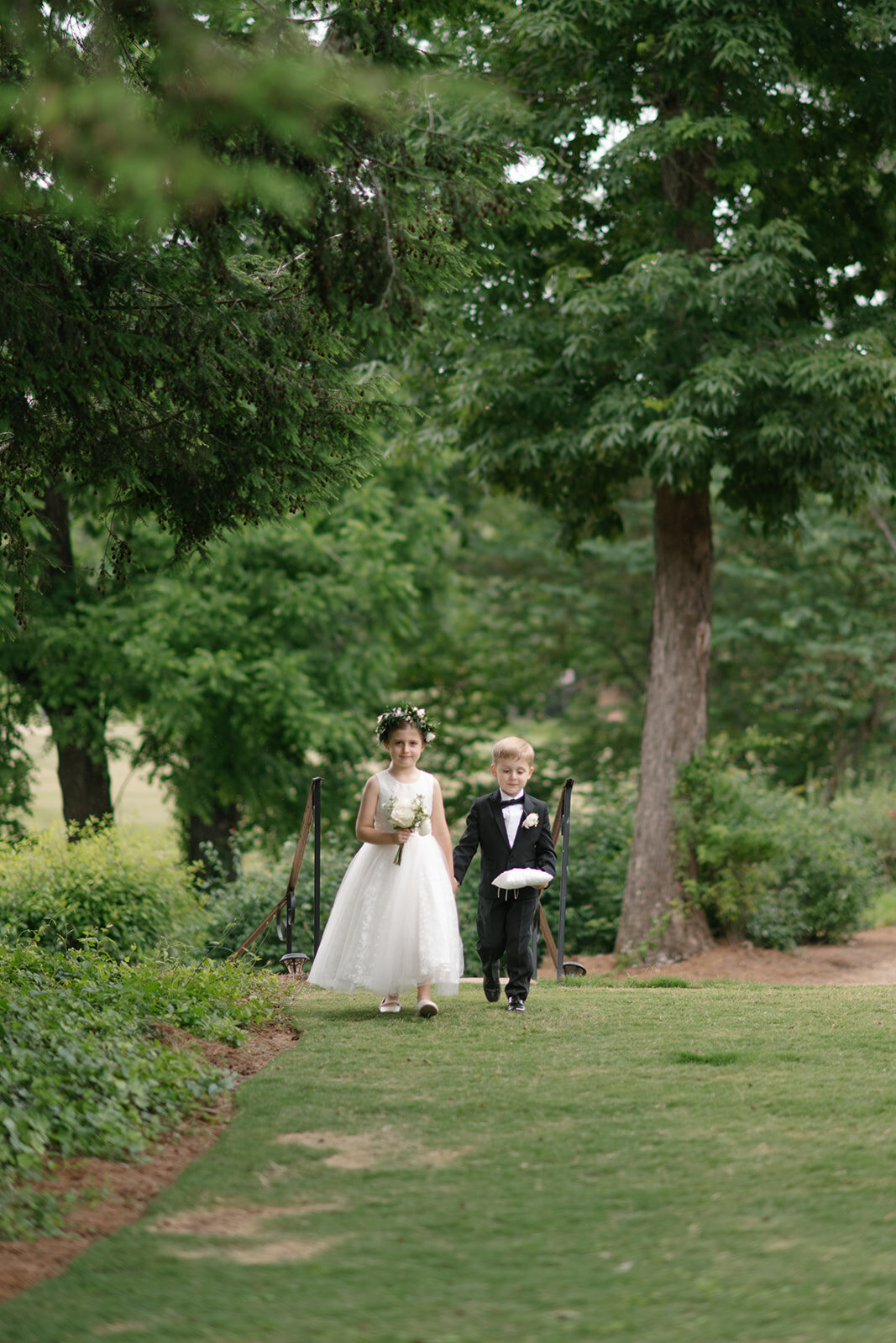 flower girl and ring bearer at wedding reception