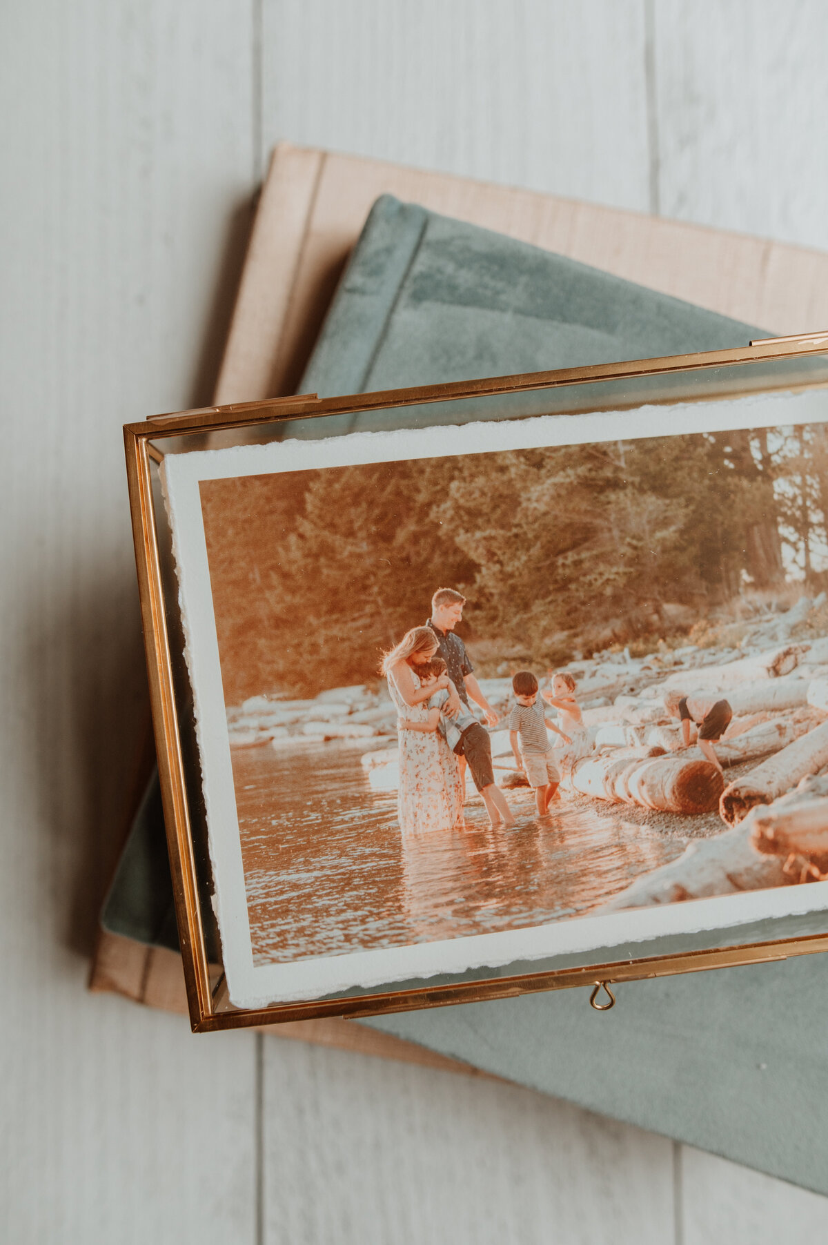 Box of prints of  family photos in Vancouver