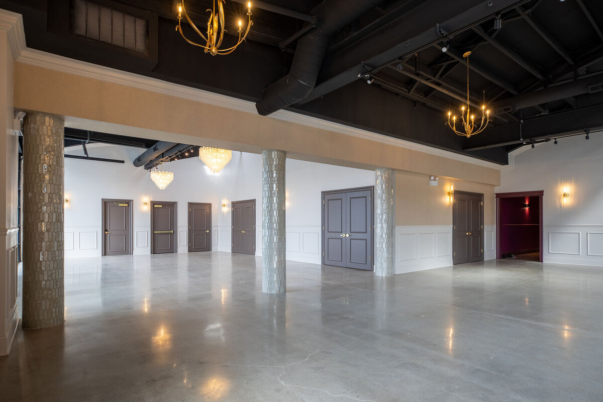 Happy Hour space extended with shimmering tiled columns, large blank slate space with natural lighting and purposeful detail throughout