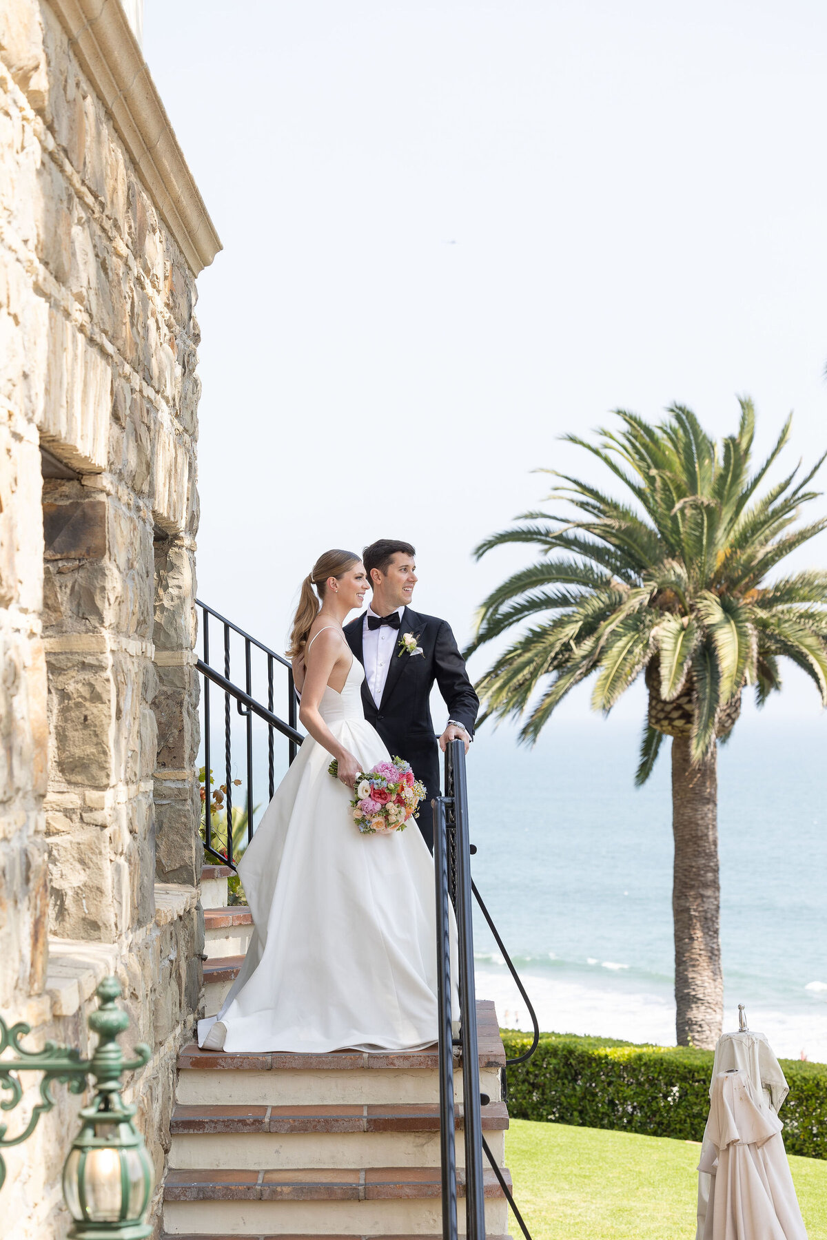 Couple on top of the stairs at Bel Air bay Club