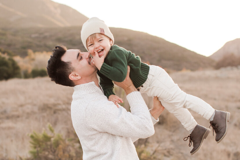 father-laughing-with-son-mission-trails-san-diego-portrait