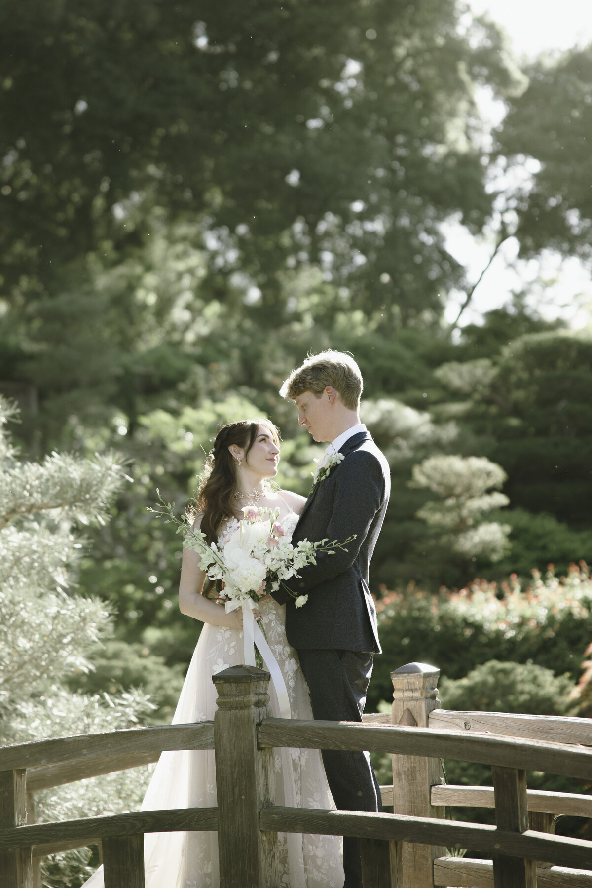 Bride and Groom posing in tea garden