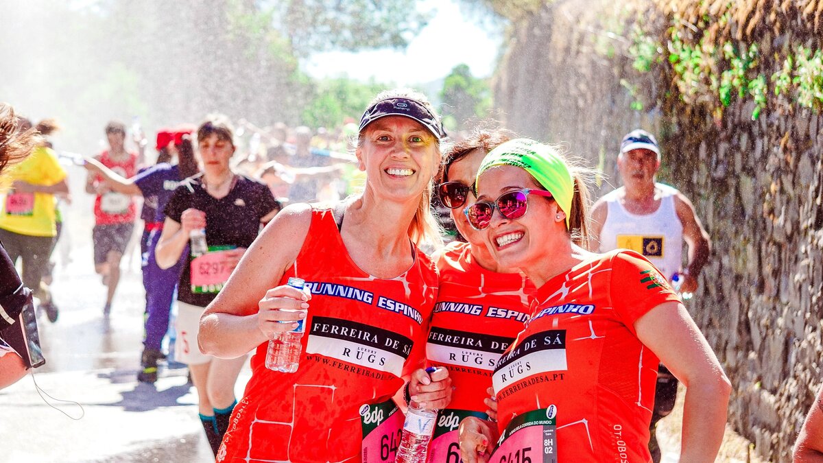 A woman runner thrilled to have finished a race
